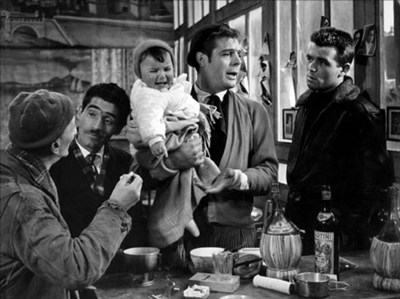 Big Deal on Madonna Street with Marcello Mastroianni holding baby